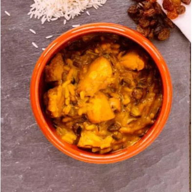 Madrás de pollo con arroz salvaje